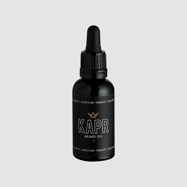 KAPR Beard Oil – elegante zwarte flacon met gouden details.
