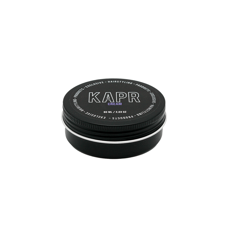 KAPR Cream – zwarte hairstyling cream pot met wit logo op transparante achtergrond.