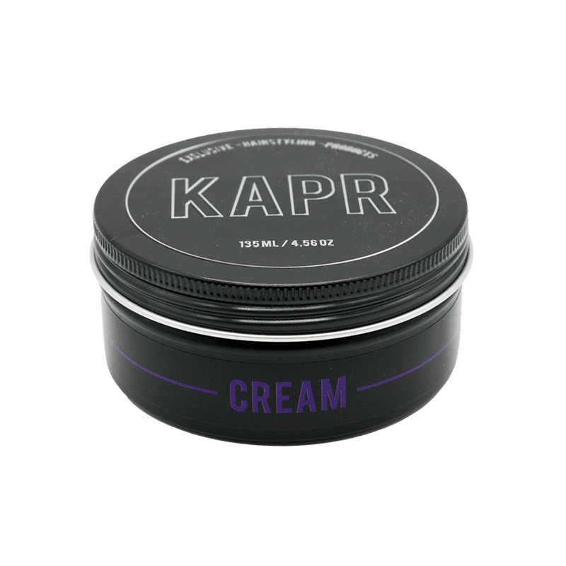 KAPR Cream – zwarte pot met wit logo en paarse tekst op transparante achtergrond, matte styling cream.
